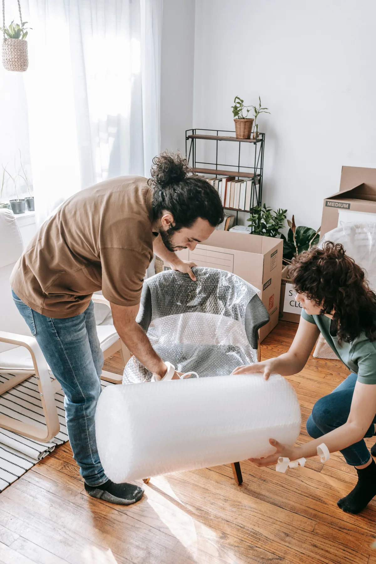 Furniture being protected with bubble wrap