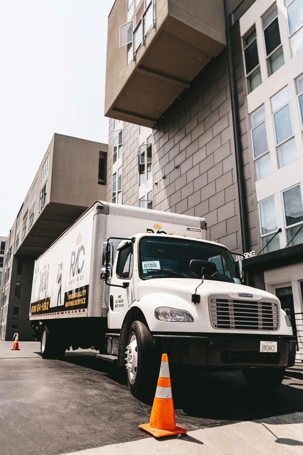Moving truck outside residential building